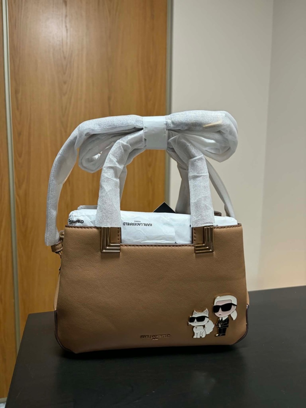 Karl Lagerfeld Tan Satchel with Character Pin and Gold Hardware